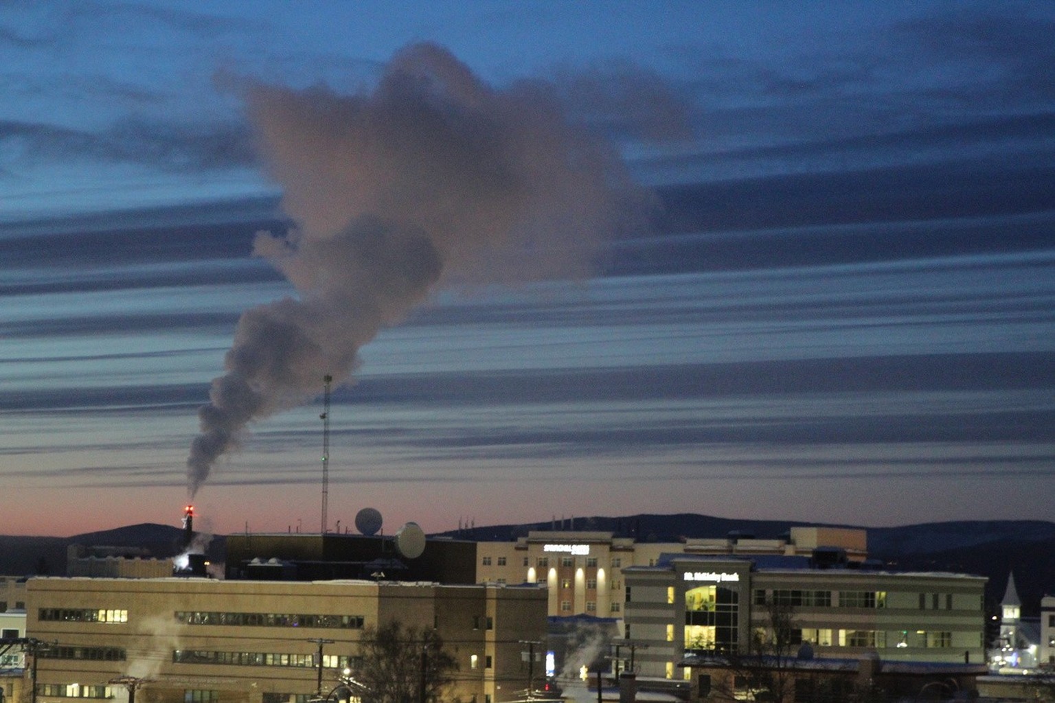 This Feb. 16, 2022, photo shows a plume of smoke being emitted into the air from a power plant in Fairbanks, Alaska, which has some of the worst polluted winter air in the United States.