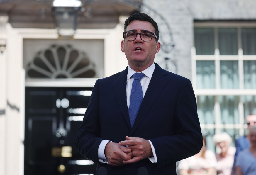 epa13122924 New British Prime Minister Andy Burnham delivers a speech outside 10 Downing Street in London, Britain, 20 July 2026. Burnham became British Prime Minister after Keir Starmer resigned. EPA ...