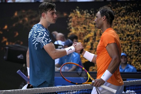 Rafael Nadal, right, of Spain is congratulated by Jack Draper of Britain following their first round match at the Australian Open tennis championship in Melbourne, Australia, Monday, Jan. 16, 2023. (A ...