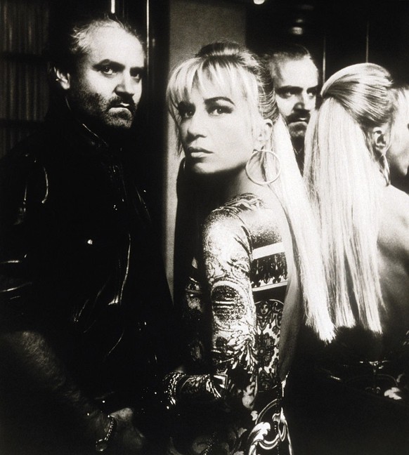 Italian fashion designer Gianni Versace stands with his sister and fellow designer Donatella Versace.(Photo by Toni Thorimbert/Sygma/Sygma via Getty Images)