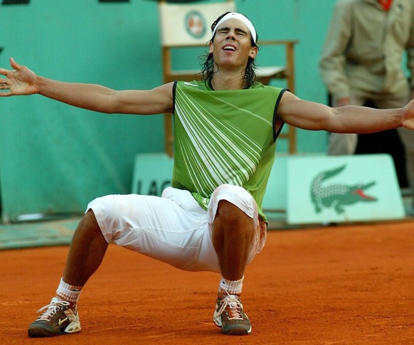 Spain&#039;s Rafael Nadal celebrates after winning the semi final match against Swiss Roger Federer at the French Open in Roland Garros, Paris, Friday 03 June 2005. Nadal won 6-3, 4-6, 6-4, 6-3. 
(KEY ...