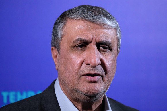 Head of Iran's Atomic Energy Organization Mohammad Eslami speaks in a new briefing after attending a conference titled "International Law Under Assault: Aggression and Self-Defense," in ...