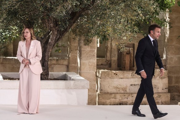FASANO, ITALY - JUNE 13: Italy's Prime Minister Giorgi Meloni greets President of France Emmanuel Macron during the first day of the G7 meeting at Borgo Egnazia resort, on June 13, 2024 in Fasano ...