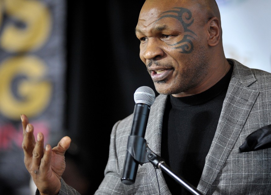 FILE - Former boxer Mike Tyson holds a news conference on Feb. 21, 2014, in Bethlehem, Pa. Authorities will not file criminal charges against former heavyweight champ Mike Tyson after he was recorded  ...