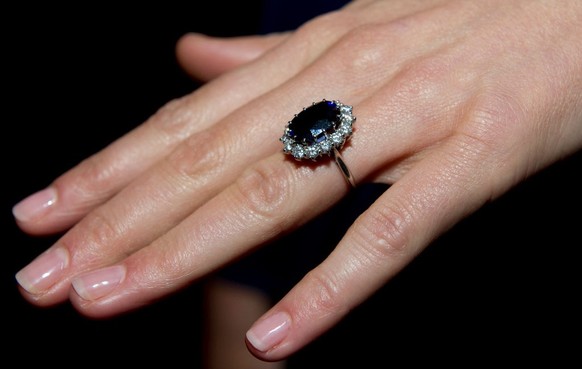 LONDON, ENGLAND - NOVEMBER 16: A close up of Kate Middleton&#039;s engagement ring as she poses for photographs in the State Apartments with her fiance Prince William of St James Palace on November 16 ...