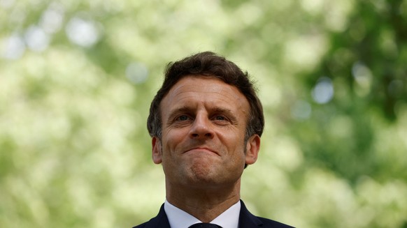 epa09938201 French President Emmanuel Macron attends a ceremony to mark the abolition of slavery and to pay tribute to the victims of slave trade, at the Luxembourg Gardens in Paris, France, 10 May 20 ...