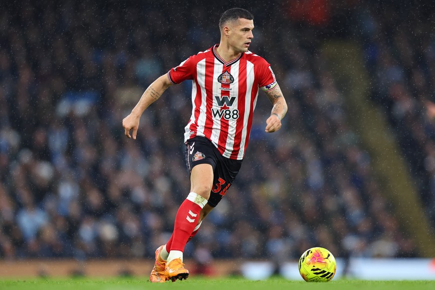 epa12575767 Granit Xhaka of Sunderland in action during the English Premier League match between Manchester City and Sunderland AFC at the Etihad Stadium in Manchester, Great Britain, 06 December 2025 ...