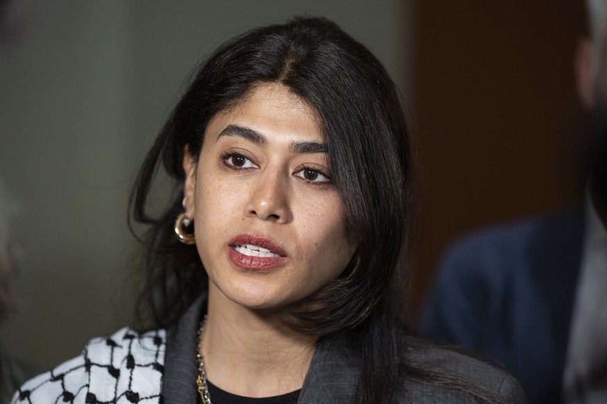 epa13038706 Rima Hassan, French-Palestinian Member of the European Parliament, lawyer and activist visits Council of States member Carlo Sommaruga (not pictured) and other parliamentarians for a meeti ...