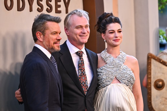 Matt Damon, from left, director Christopher Nolan, and Anne Hathaway attend the premiere of "The Odyssey" at AMC Lincoln Square on Tuesday, July 14, 2026, in New York. (Photo by Evan Agostin ...