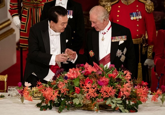 South Korean President state visit to the UK President of South Korea Yoon Suk Yeol listens as King Charles III speaks at the state banquet at Buckingham Palace, London, for the state visit to the UK  ...