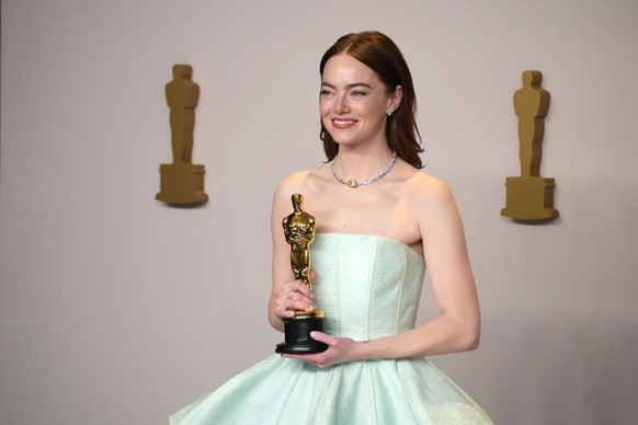 HOLLYWOOD, CALIFORNIA - MARCH 10: Emma Stone poses in the press room during the 96th Annual Academy Awards at Ovation Hollywood on March 10, 2024 in Hollywood, California. (Photo by Jeff Kravitz/FilmM ...