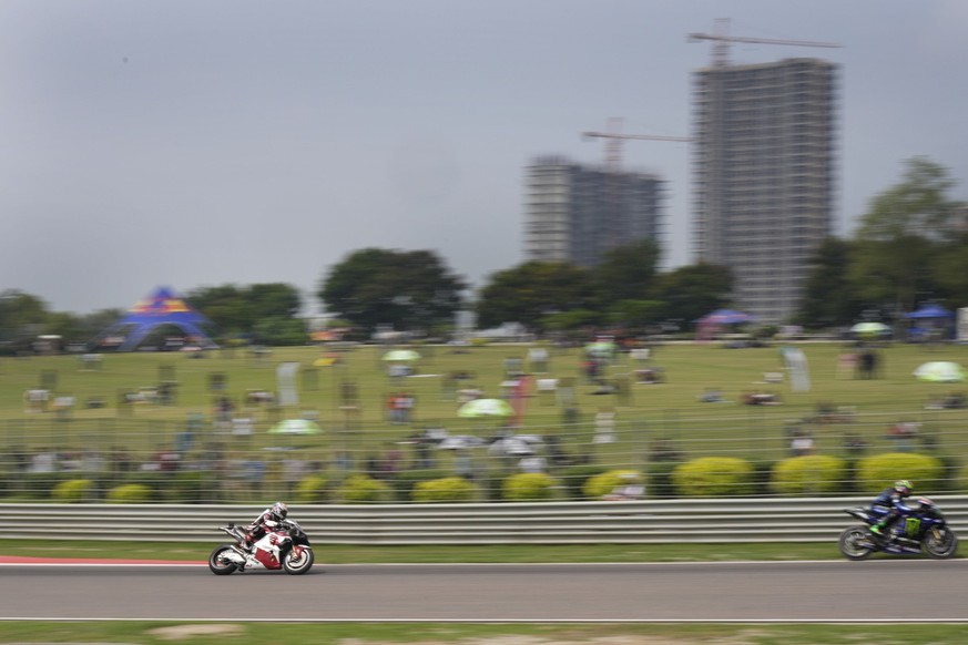 Riders compete at the qualifying rounds during Moto GP Bharat in Greater Noida, on the outskirts of New Delhi, India Saturday, Sept. 23, 2023. (AP Photo/Manish Swarup)