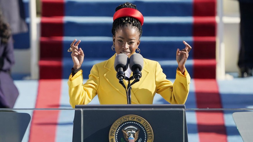 American poet Amanda Gorman reads a poem during the 59th Presidential Inauguration at the U.S. Capitol in Washington, Wednesday, Jan. 20, 2021. (AP Photo/Patrick Semansky, Pool)