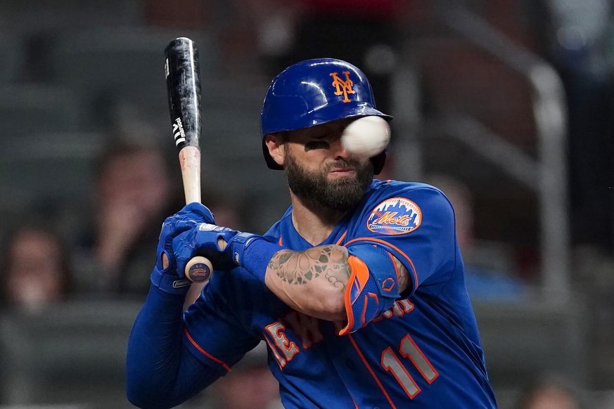 New York Mets&#039; Kevin Pillar is hit in the face with a pitch from Atlanta Braves pitcher Jacob Webb in the seventh inning of a baseball game Monday, May 17, 2021, in Atlanta. (AP Photo/John Bazemo ...