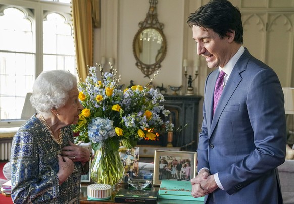 Britain&#039;s Queen Elizabeth II receives Canada&#039;s Prime Minister Justin Trudeau during an audience at Windsor Castle, Windsor, England, Monday March 7, 2022. (Steve Parsons/Pool via AP)