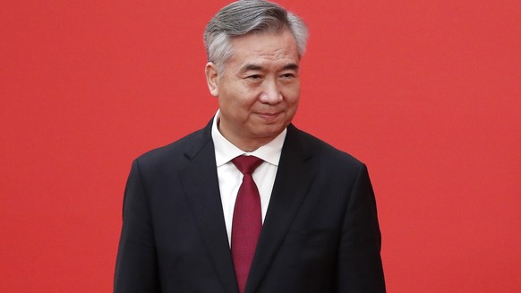 epa10260291 New member of the Standing Committee of the Political Bureau of the 20th Chinese Communist Party (CPC) Central Committee Li Xi looks on during a press conference at the Great Hall of Peopl ...