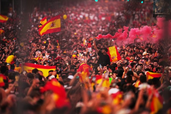 Fans wait for the arrival of players from Spain's national soccer team during celebrations in Madrid on Monday, July 20, 2026, after Spain defeated Argentina in the World Cup final in East Ruther ...