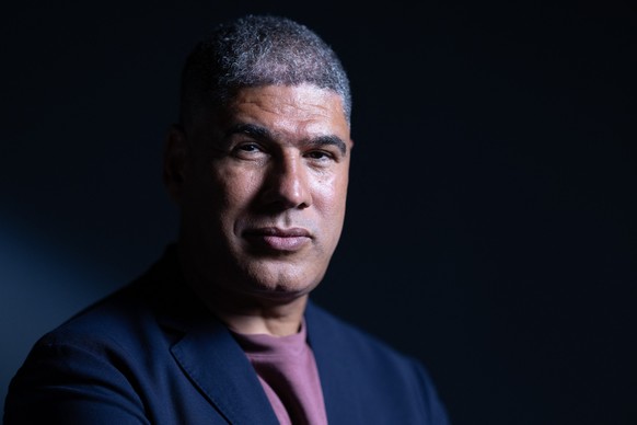 Moroccan writer Rachid Benzine poses during a photo session in Paris on August 25, 2025. (Photo by Xavier GALIANA / AFP)