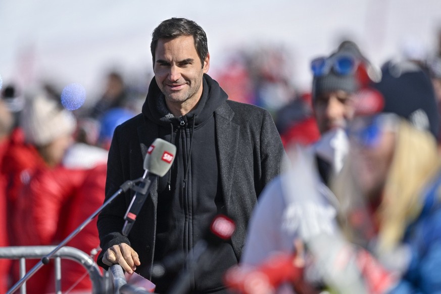 Swiss tennis player Roger Federer gives a TV interview at the women&#039;s Super-G race at the FIS Alpine Ski World Cup in Lenzerheide, Switzerland, Saturday, March 5, 2022. (KEYSTONE/Gian Ehrenzeller ...