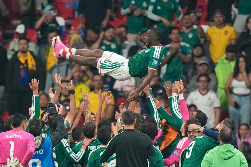 Mexico's Julian Quinones (16) is tossed into the air by his teammates after the World Cup round of 32 soccer match between Mexico and Ecuador in Mexico City, Tuesday, June 30, 2026. (AP Photo/Fer ...