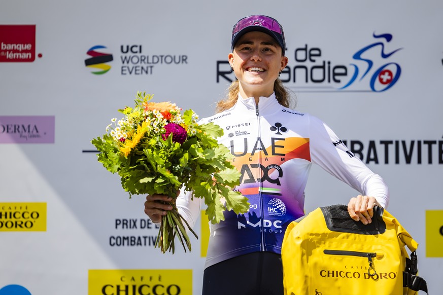 epa12302310 UAE Team ADQ rider Paula Blasi from Spain celebrates on the podium after winning the first stage of the Tour de Romandie Feminin cycling race, a 4.39km individual time trial between Huemoz ...