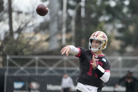 San Francisco 49ers quarterback Brock Purdy (13) throws a pass during practice at the team&#039;s NFL football training facility in Santa Clara, Calif., Thursday, Feb. 1, 2024. The 49ers will face the ...