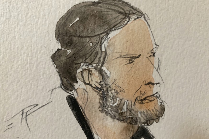 FILE - This Sept.8, 2021 file courtroom sketch shows key defendant Salah Abdeslam, in the special courtroom built for the 2015 attacks trial, in Paris. The key defendant in the 2015 Paris attacks tria ...