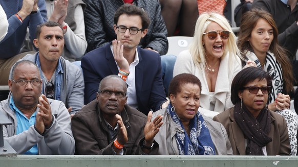 PARIS, FRANCE - MAY 29: Gael Monfils&#039; father Rufin Monfils (2nd left), his mother Sylvette Cartesse (far right), above them Brahim Asloum (far left) attend day 6 of the French Open 2015 at Roland ...