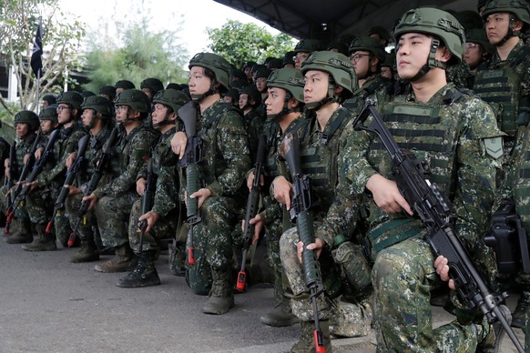 Taiwan reservists pose during a reserve military training in Ilan County, Taiwan, Tuesday, Dec. 2, 2025. (AP Photo/Chiang Ying-ying)
Taiwan Military