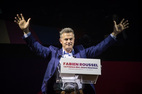 epa09764159 French Communist party (PCF) candidate to the 2022 presidential elections Fabien Roussel addresses his supporters during a meeting as part of his campaign in Montreuil, outside Paris, Fran ...