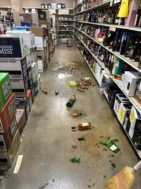 In this photo provided by Samantha Martin, broken bottles are seen after a raccoon enters a liquor store on Saturday, Nov. 29, 2025, in Ashland, Va. (Samantha Martin/Hanover County Protection via AP)
 ...