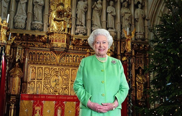 LONDON - DECEMBER 24: (EMBARGOED TO 0001 MONDAY DECEMBER 25, 2006. NO PUBLICATION IN UK MEDIA FOR 28 DAYS) Britain&#039;s Queen Elizabeth II smiles after filming this year&#039;s Christmas broadcast i ...