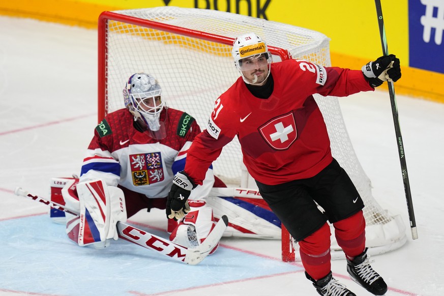 Switzerland&#039;s Kevin Fiala celebrates after scoring past Czech Republic&#039;s goalkeeper Lukas Dostal during the penalty shootout of the preliminary round match between Czech Republic and Switzer ...