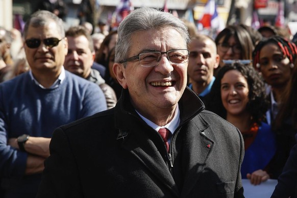 French far-left candidate for the upcoming presidential election Jean-Luc Melenchon, smiles during a march in Paris, Sunday, March 20, 2022. Jean-Luc Melenchon is rising in the polls ahead of April 10 ...