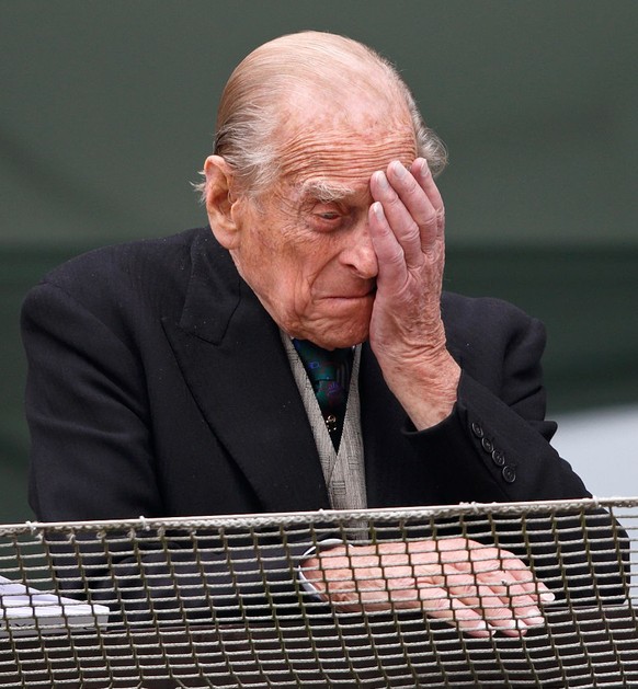 EPSOM, UNITED KINGDOM - JUNE 04: (EMBARGOED FOR PUBLICATION IN UK NEWSPAPERS UNTIL 48 HOURS AFTER CREATE DATE AND TIME) Prince Philip, Duke of Edinburgh watches the racing from the balcony of the Roya ...
