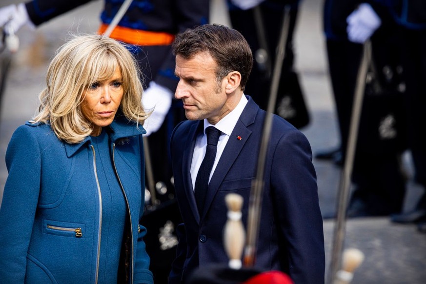 AMSTERDAM, NETHERLANDS - APRIL 11: French President Emmanuel Macron and his wife Brigitte Macron during an official welcome ceremony at the Royal Palace on April 11, 2023 in Amsterdam, Netherlands. Th ...