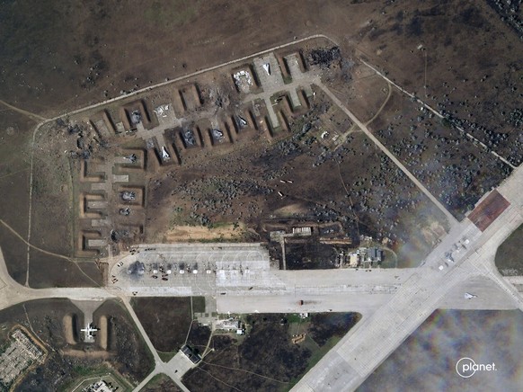 This satellite image provided by Planet Labs PBC shows destroyed Russian aircraft at Saki Air Base after an explosion Tuesday, Aug. 9, 2022, in the Crimean Peninsula, the Black Sea peninsula seized fr ...