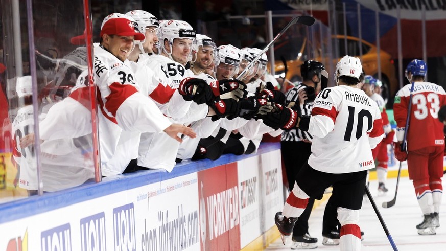 epa10644547 Switzerland&#039;s forward Andres Ambuehl (R) celebrates with team mates after scoring the 1-3 during the group B match between Czech Republic and Switzerland at the IIHF 2023 Ice Hockey W ...