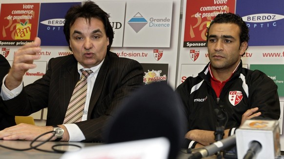 Egypt&#039;s goalkeeper Essam El-Hadary, right, listens to FC Sion president Christian Constantin, left, during a press conference in Martigny, south-western Switzerland, 27 February 2008. Essam El-Ha ...