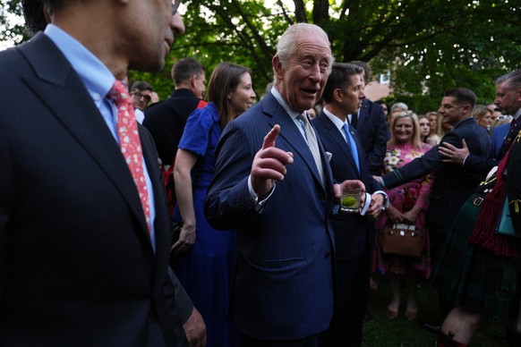Britain's King Charles III attends a garden party at the British Embassy, Monday, April 27, 2026, in Washington. (AP Photo/Julia Demaree Nikhinson, Pool)