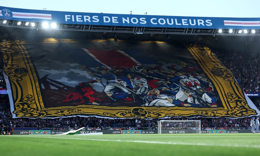 PARIS, FRANCE - APRIL 28: General view inside the stadium as fans of Paris Saint-Germain display a tifo prior to the UEFA Champions League 2025/26 Semi Final First Leg match between Paris Saint-Germai ...
