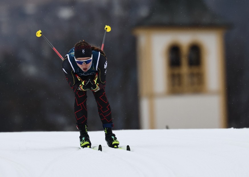 epa12737752 Katharina Hennig Dotzler of Germany competes in the Women's 4x7.5km Relay of the Cross-Country Skiing competitions at the Milano Cortina 2026 Winter Olympic Games, in Tesero, Italy, 1 ...
