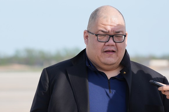 White House communications director Steven Cheung talks to reporters after arriving with Vice President JD Vance on Air Force Two, Sunday, April 12, 2026, at Joint Base Andrews, Md., after returning f ...