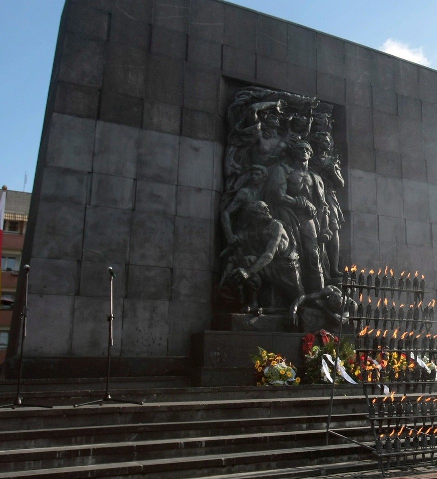 epa03216877 Picture taken 09 October 2009 shows the Ghetto Heroes Monument during the funeral of Marek Edelman, Warsaw, Poland. Warsaw is one of four host cities in Poland for the UEFA EURO 2012 socce ...