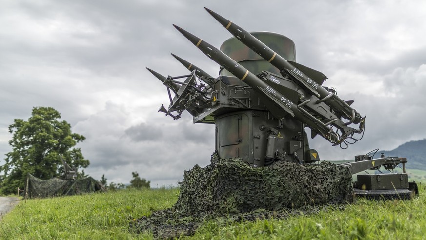 The rapier with the four surface-to-air missiles stands on a hill, and nearby, there is also its radar and the missile control, pictured on site of the anti-aircraft division of the Swiss Armed Forces ...