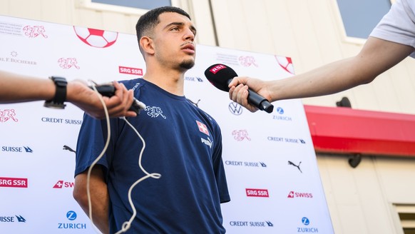 Switzerland&#039;s forward Zeki Amdouni speaks with journalists after a training session of the Swiss national soccer team, in Riddes, Switzerland, Wednesday, September 6, 2023. Switzerland faces Koso ...