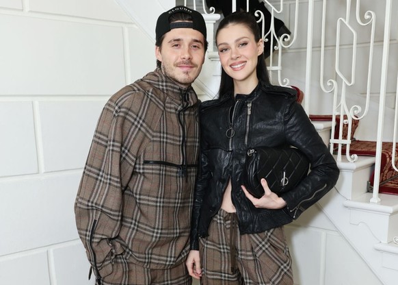 LONDON, ENGLAND - FEBRUARY 24: Brooklyn Beckham and Nicola Peltz attend the after-party for the Burberry Winter 2025 show during London Fashion Week at The Twenty Two on February 24, 2025 in London, E ...