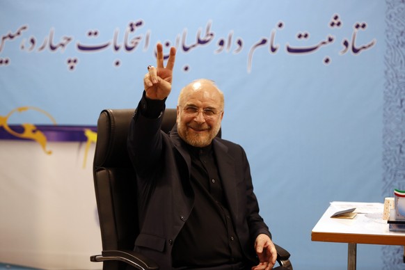 epa11387280 Speaker of the Parliament of Iran, Mohammad Bagher Ghalibaf, gestures as he registers his candidacy on the last day of registration for the Iranian presidential election at the Interior Mi ...