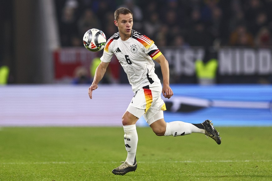 epa11724922 Joshua Kimmich of Germany in action during the UEFA Nations League soccer match between Germany and Bosnia and Herzegovina in Freiburg, Germany, 16 November 2024. EPA/ANNA SZILAGYI
