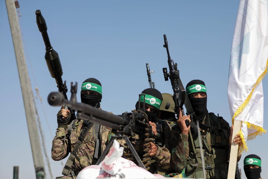 July 19, 2023: Gaza, Palestine. 19 July 2023. Fighters from the Izz al-Din al-Qassam Brigades, the military wing of Hamas, take part in a military parade near the border with Israel in the central Gaz ...